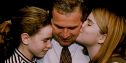 George W. Bush Hugging Daughters